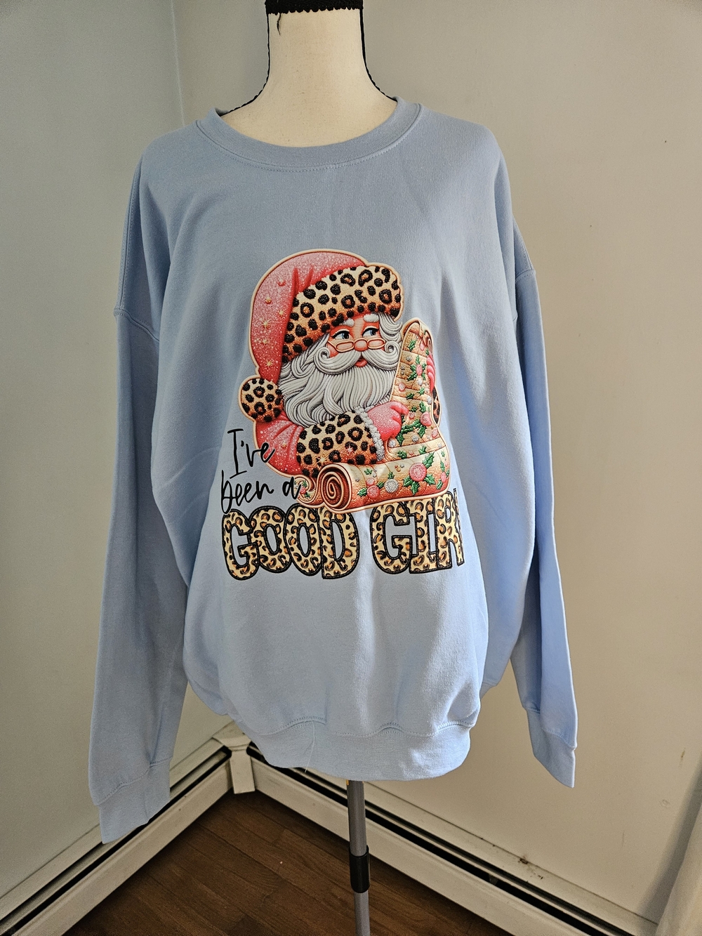 Gildan Light Blue Santa Graphic Crewneck with Leopard Accents. Sweatshirt